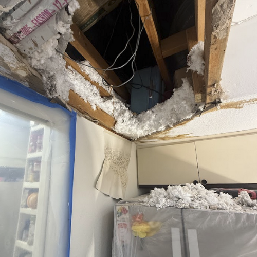 AC leak causing water damage in kitchen drop ceiling